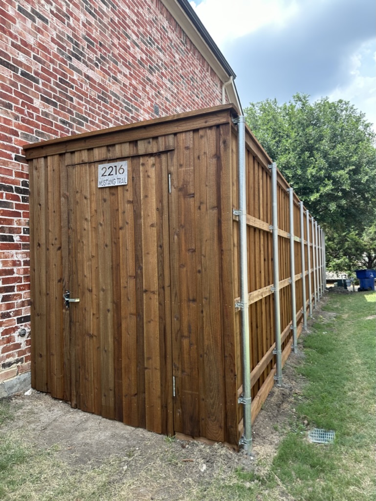 Cedar side-yard gate enclosure with galvanized steel posts at a Mustang Trail home