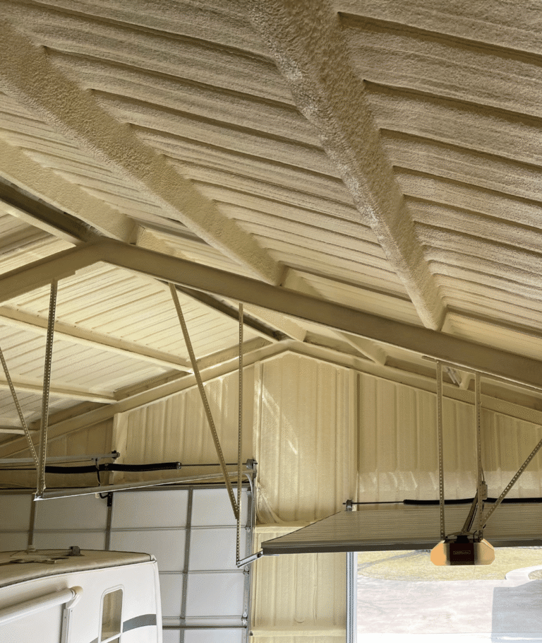 Spray foam insulated ceiling in a custom man cave shop build for energy efficiency