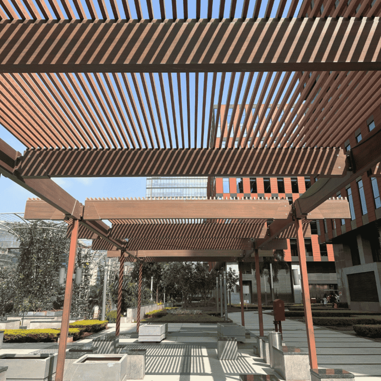 Wooden slatted pergola walkway in a landscaped Rockwall outdoor space